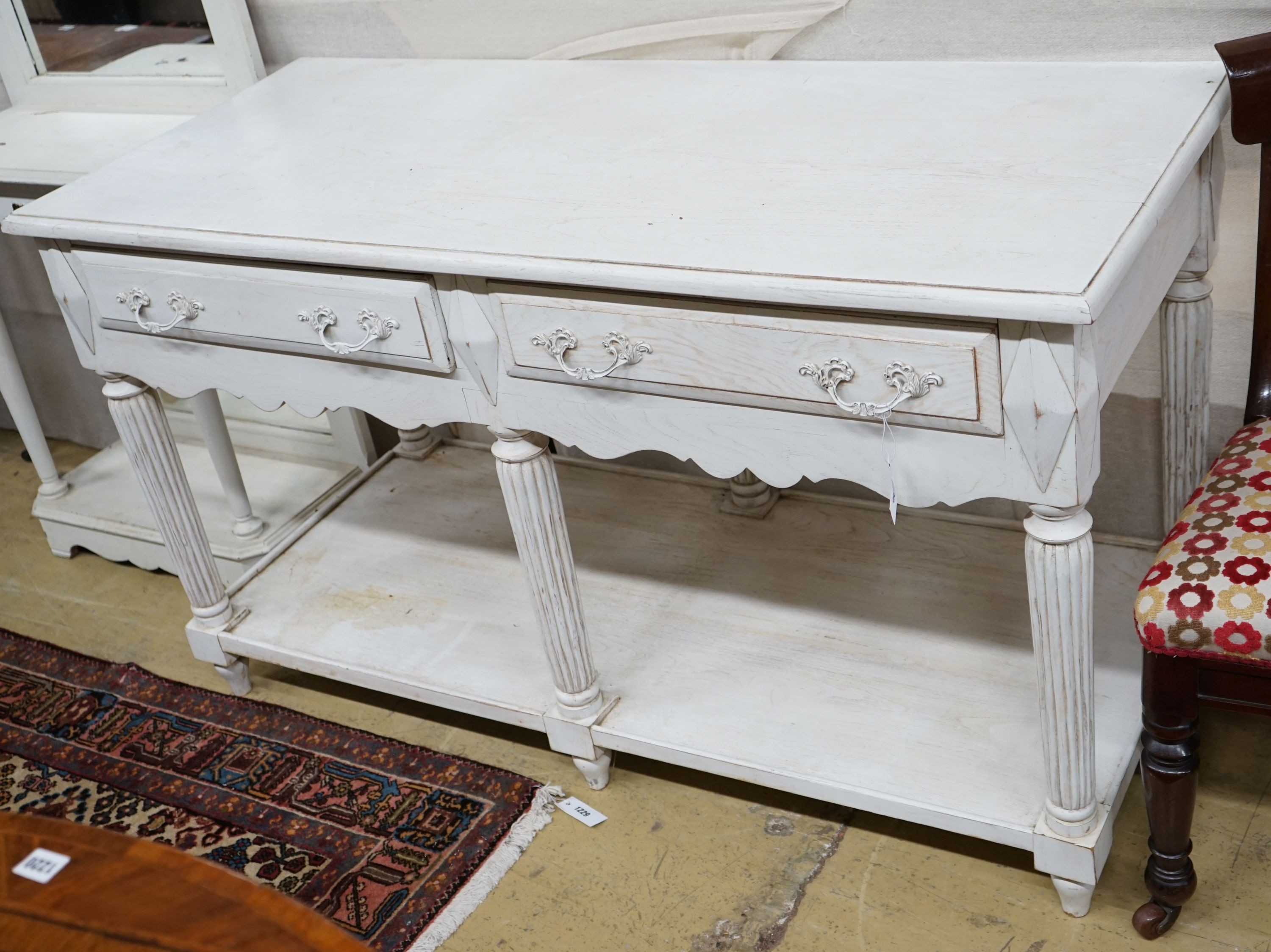 A Victorian style limed oak two drawer console table, width 140cm, depth 60cm, height 80cm